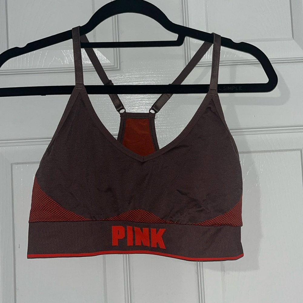 Pink Victoria’s Secret sports bra